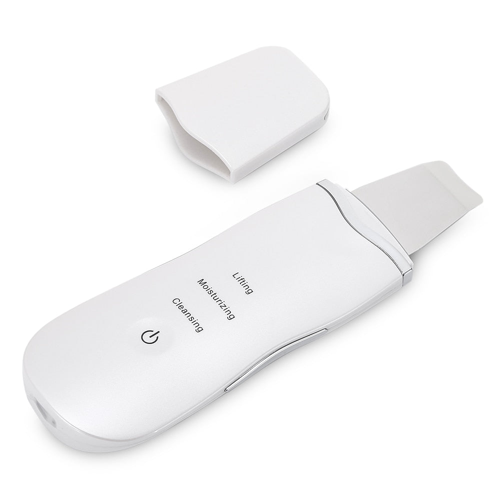White ultrasonic facial cleansing instrument with detachable spatula head, compact handheld design, features lifting, moisturizing, and cleaning functions