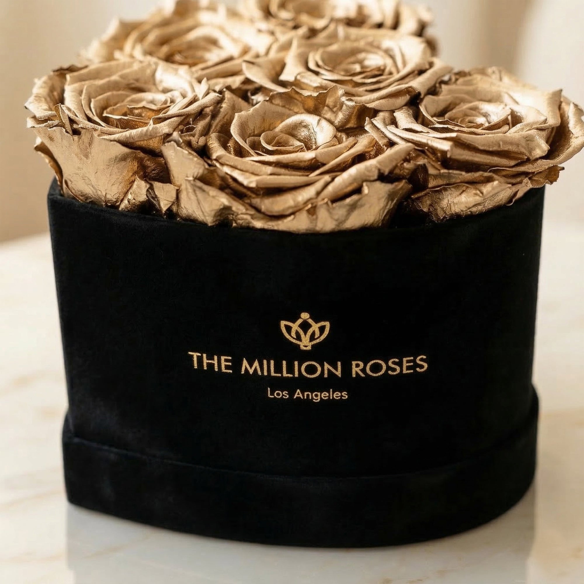 Gold roses in black box with gold logo, decorative dried flower arrangement for elegant home decor, SKU: 01112000149021