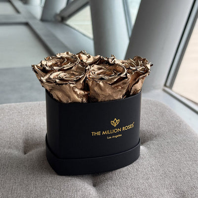 Gold roses in black box, decorative dried flower arrangement on table, perfect for luxury home decor, SKU: 01112000149021